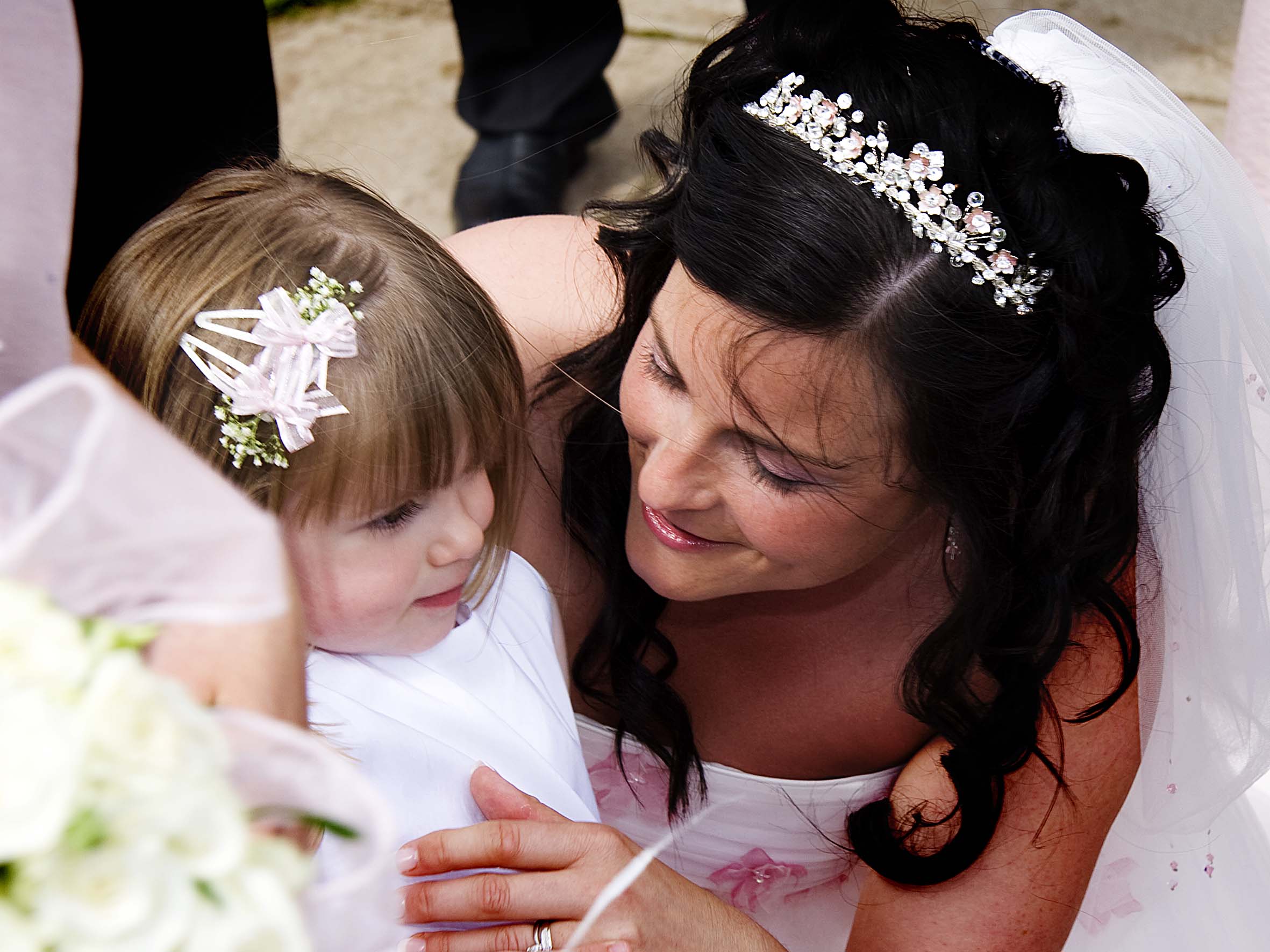 Bride and young bridesmaid